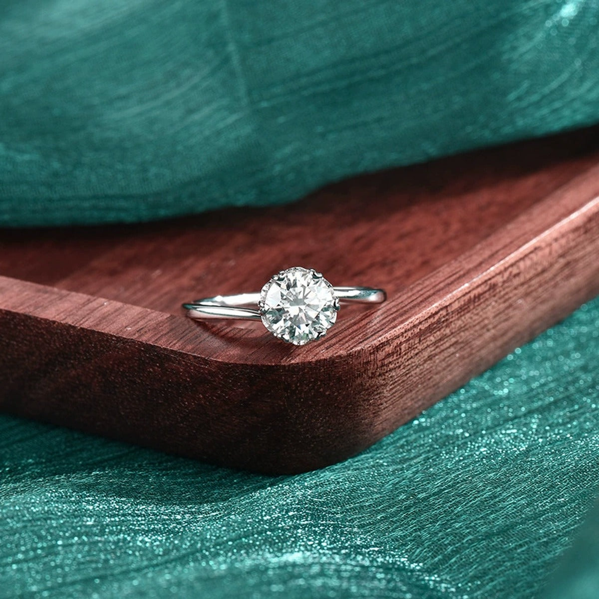 Six-Prong Round Moissanite Solitaire Engagement Ring close-up detail view with moissanite sparkle