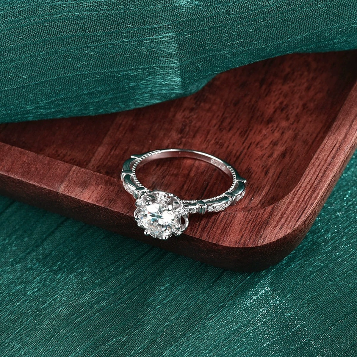 Vintage Six-Prong Round Moissanite Engagement Ring with CZ close-up detail view with moissanite sparkle