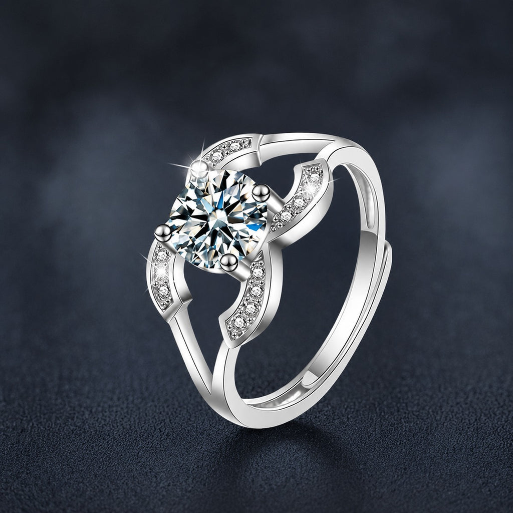 Four-Prong Round Moissanite Adjustable Engagement Ring with CZ close-up detail view with moissanite sparkle