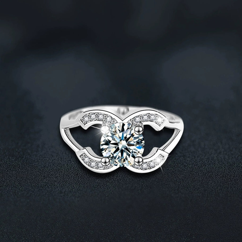 Four-Prong Round Moissanite Adjustable Engagement Ring with CZ close-up detail view with moissanite sparkle