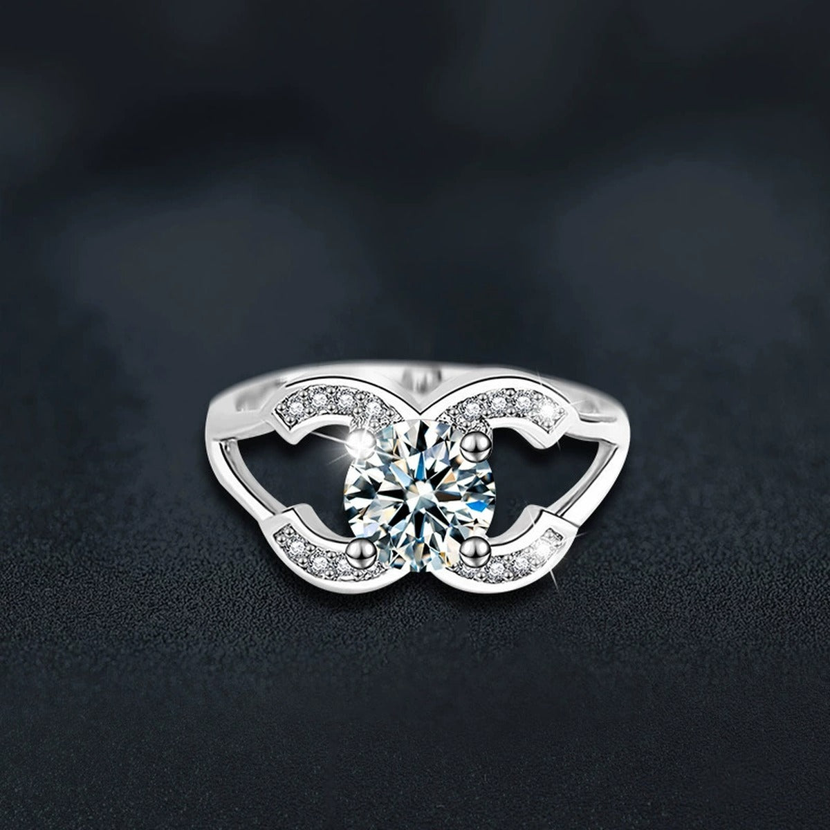 Four-Prong Round Moissanite Adjustable Engagement Ring with CZ close-up detail view with moissanite sparkle