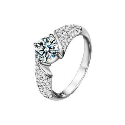 Four-Prong Round Moissanite Wedding Ring with CZ in white gold-plated S925 sterling silver on clean white background