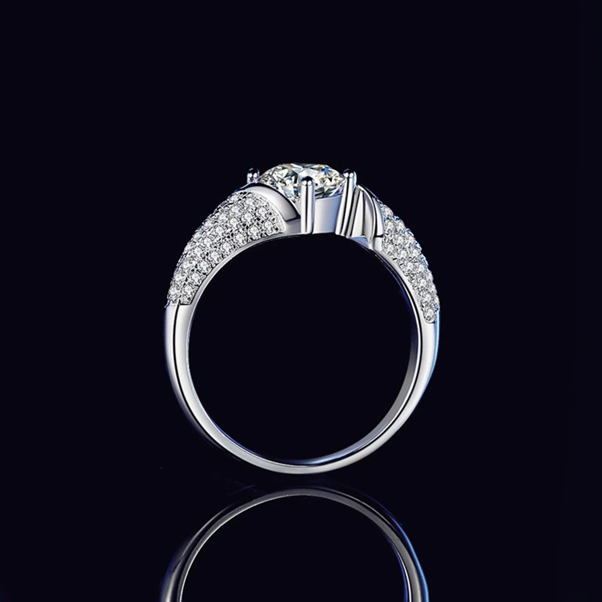 Four-Prong Round Moissanite Wedding Ring with CZ close-up detail view with moissanite sparkle