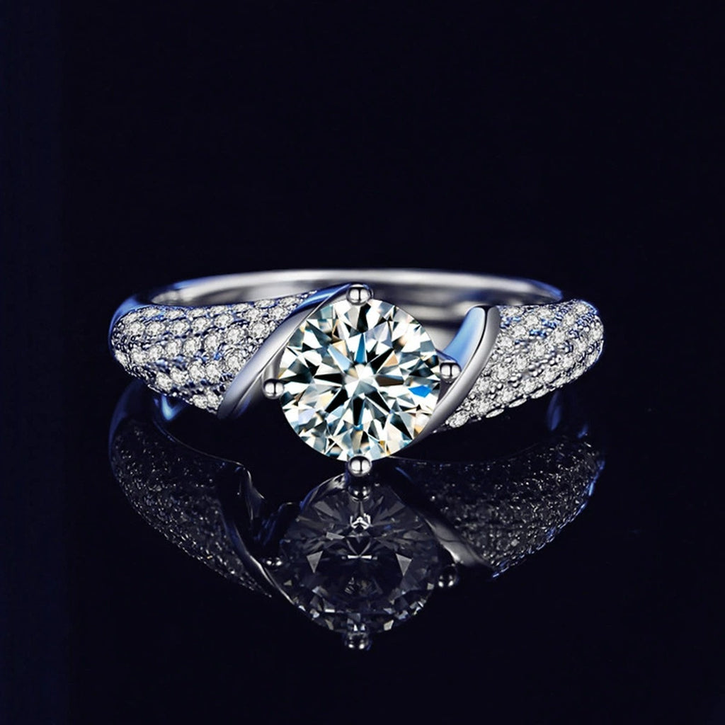Four-Prong Round Moissanite Wedding Ring with CZ close-up detail view with moissanite sparkle