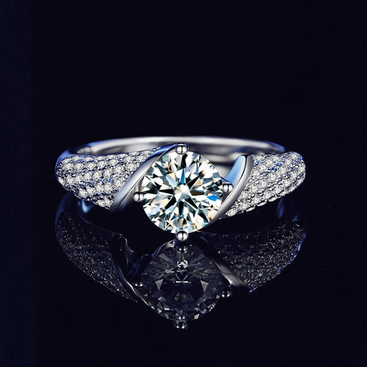 Four-Prong Round Moissanite Wedding Ring with CZ close-up detail view with moissanite sparkle