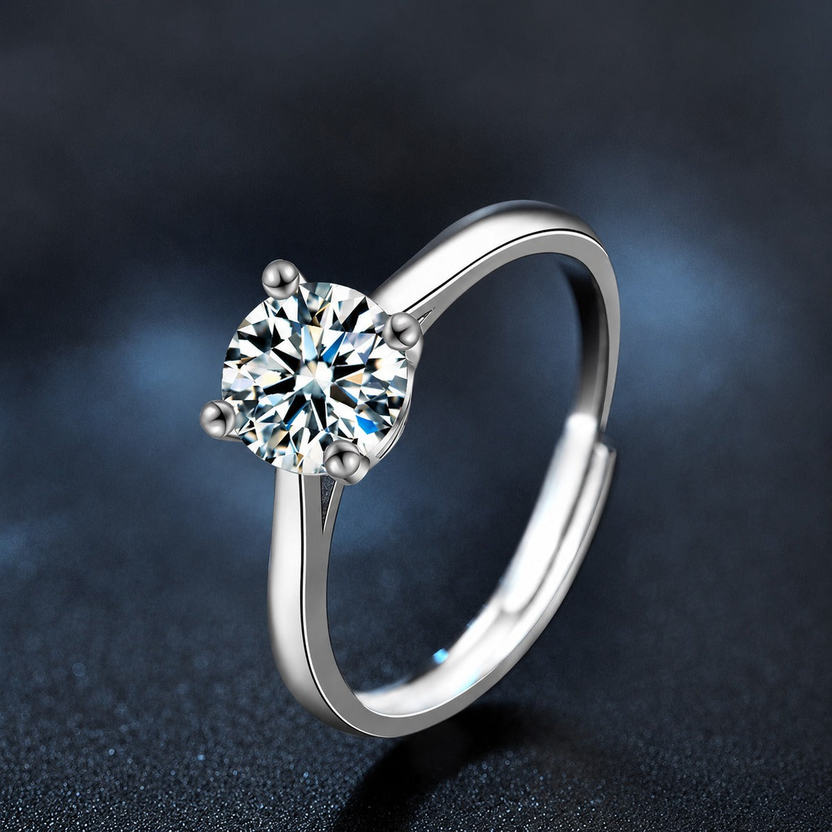 Four-Prong Round Moissanite Adjustable Solitaire Engagement Ring close-up detail view with moissanite sparkle
