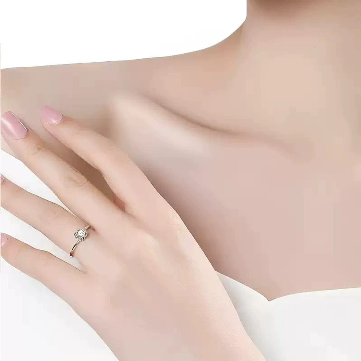 Floral Round Moissanite Engagement Ring worn on hand to show scale, band width, and ring profile
