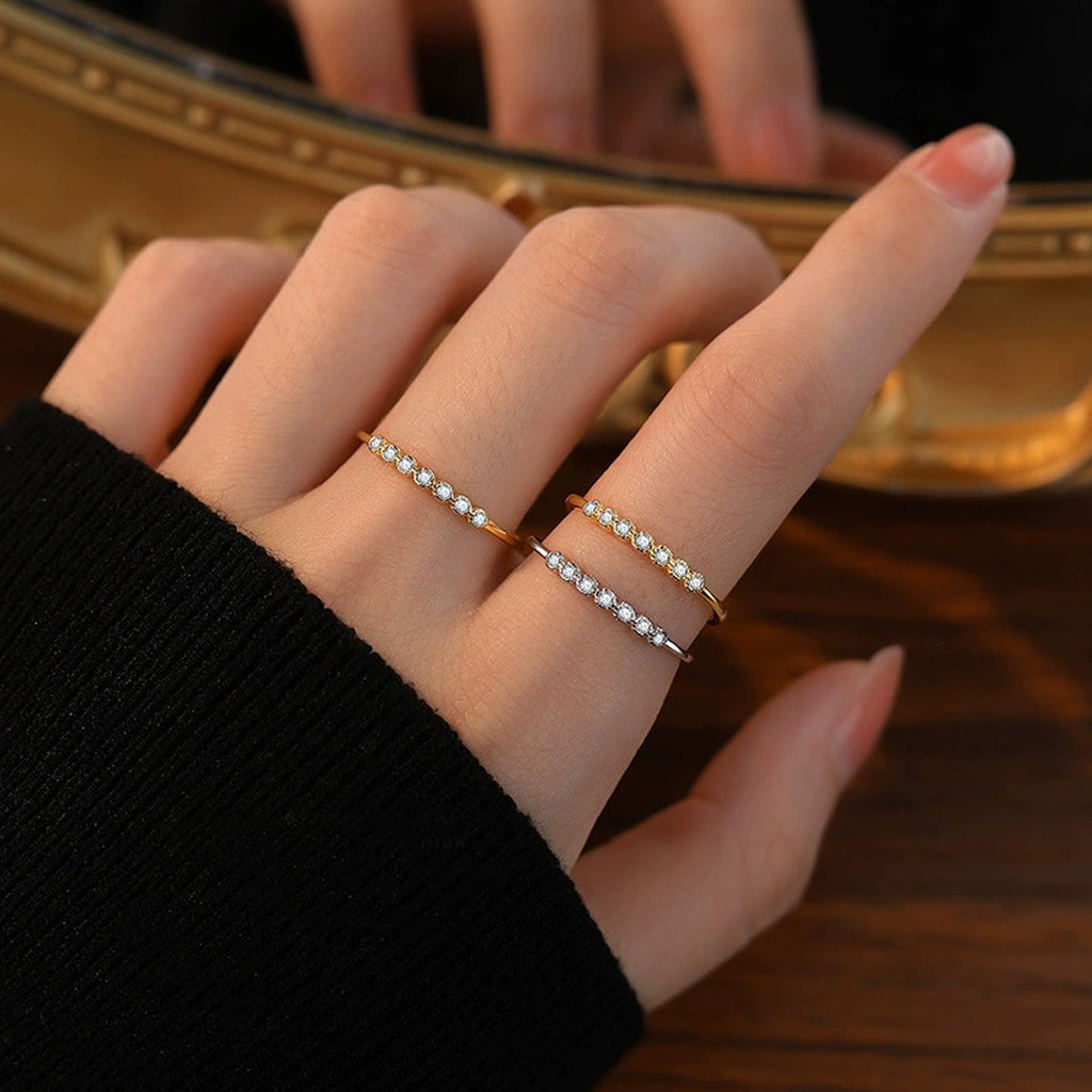Bezel Round Moissanite Adjustable Wedding Band worn on hand to show scale, band width, and ring profile