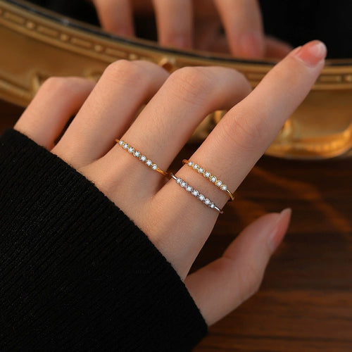Bezel Round Moissanite Adjustable Wedding Band worn on hand to show scale, band width, and ring profile