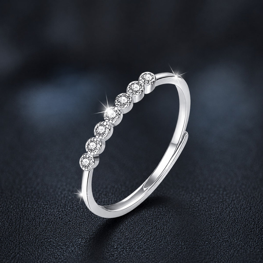 Bezel Round Moissanite Adjustable Wedding Band close-up detail view with moissanite sparkle