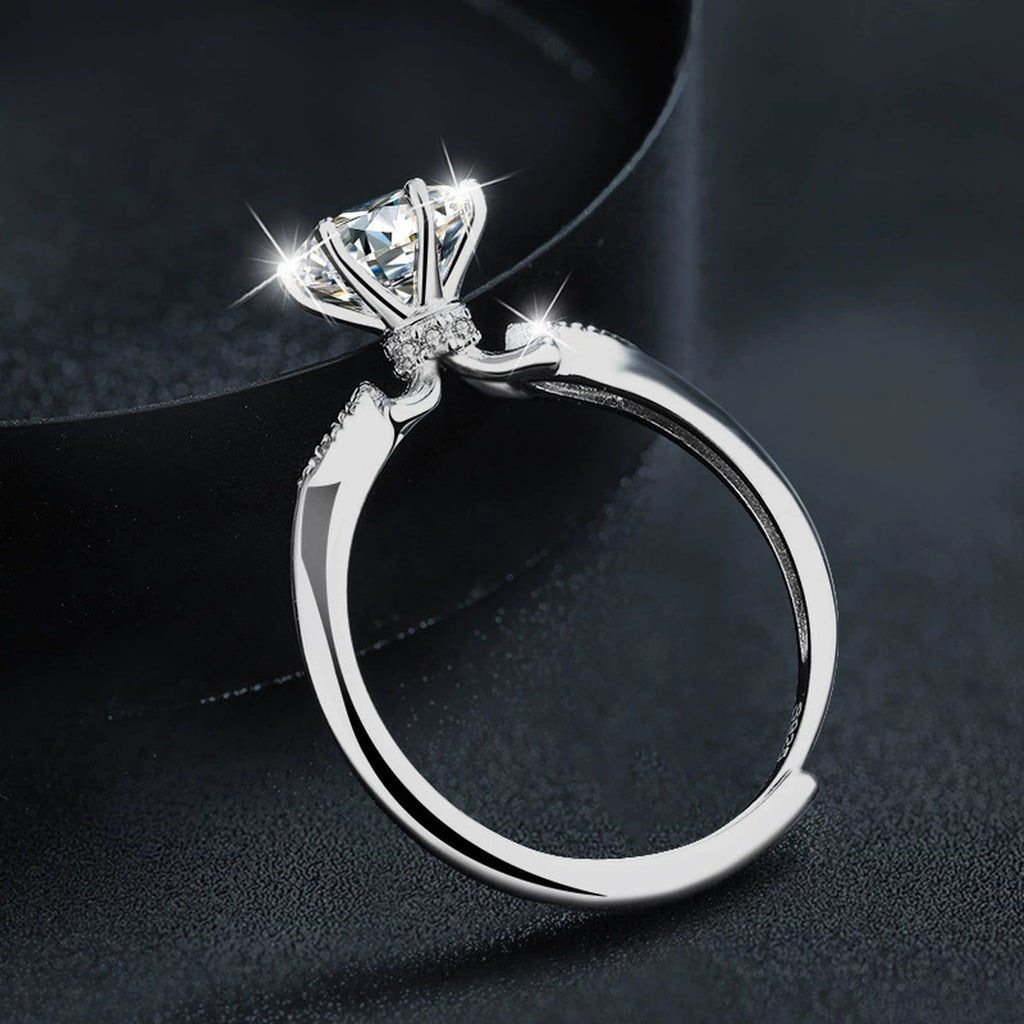 Six-Prong Round Moissanite Adjustable Engagement Ring with CZ close-up detail view with moissanite sparkle