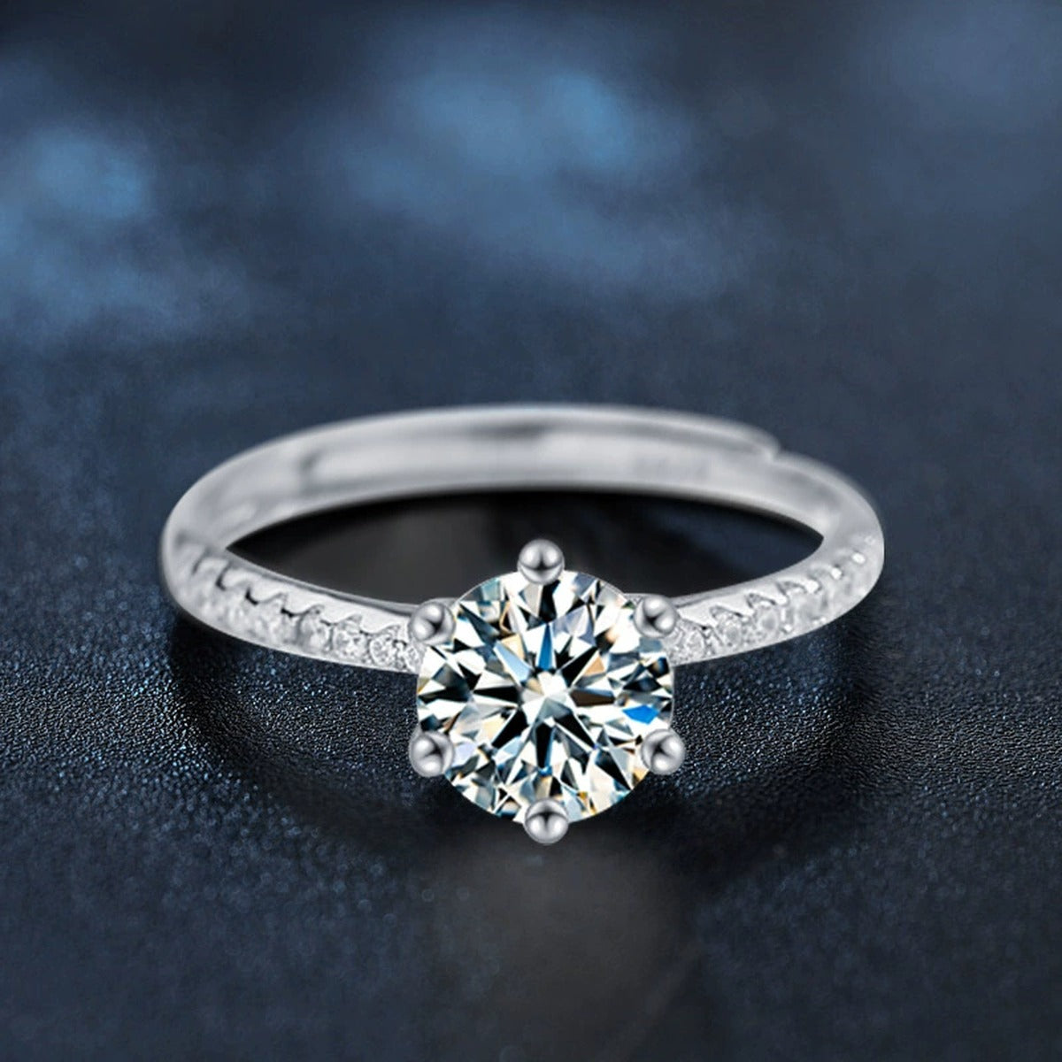 Six-Prong Round Moissanite Adjustable Engagement Ring with CZ close-up detail view with moissanite sparkle