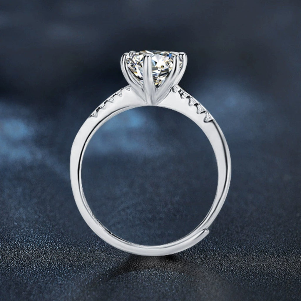 Six-Prong Round Moissanite Adjustable Engagement Ring with CZ close-up detail view with moissanite sparkle