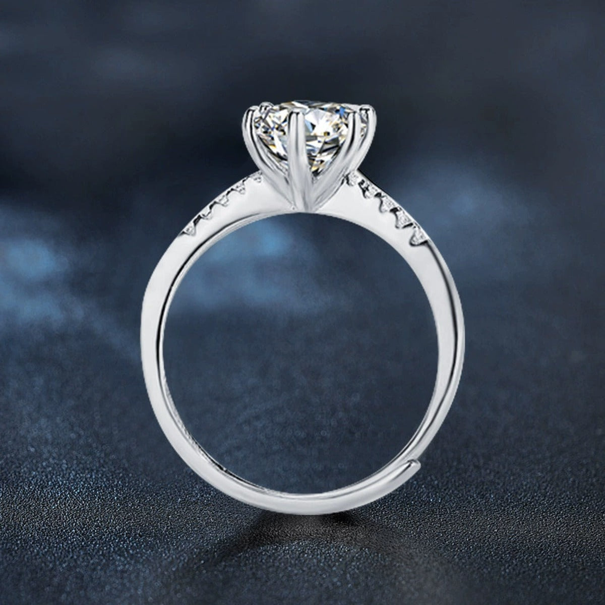 Six-Prong Round Moissanite Adjustable Engagement Ring with CZ close-up detail view with moissanite sparkle