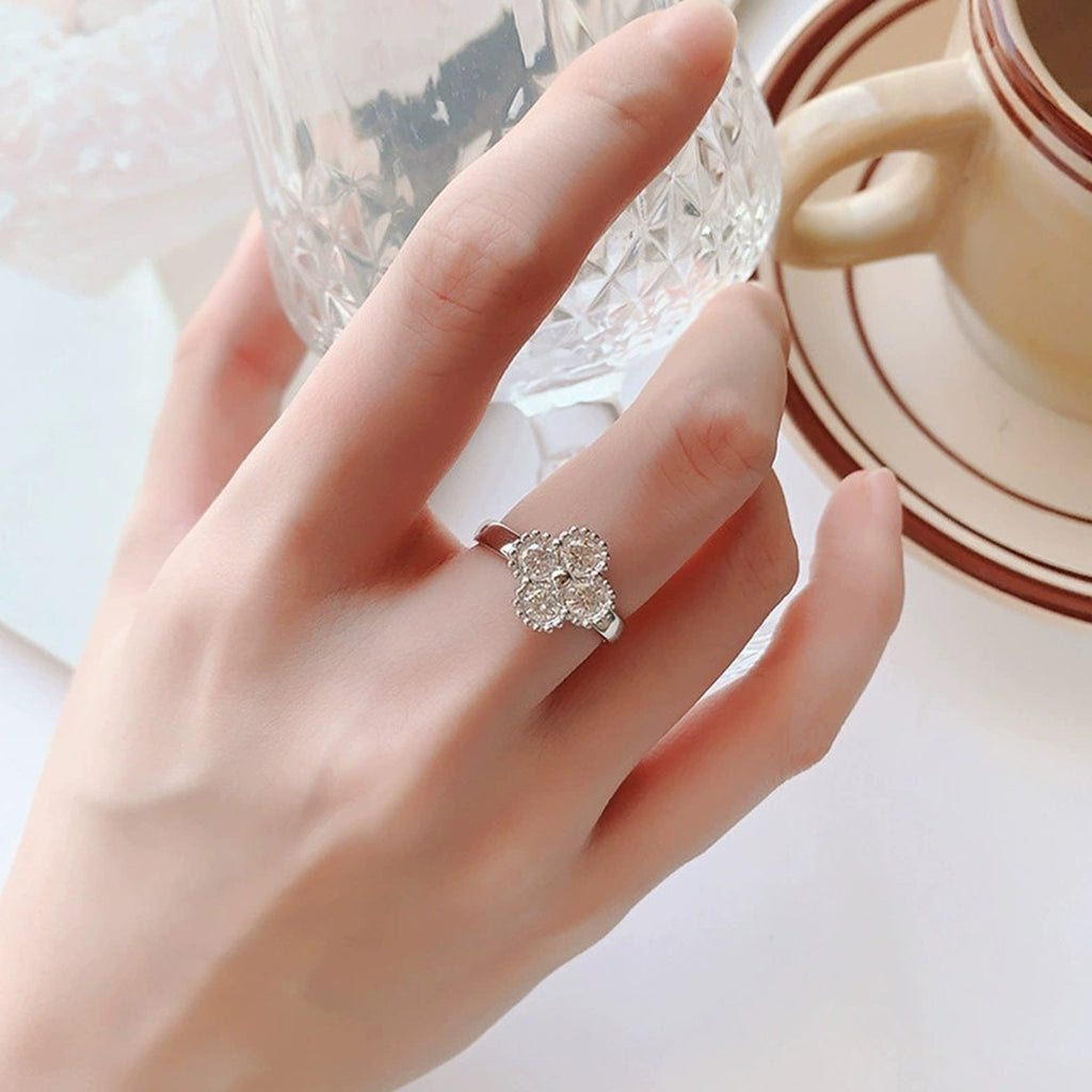 Four-Leaf Clover Round Moissanite Adjustable Fashion Ring worn on hand to show scale, band width, and ring profile