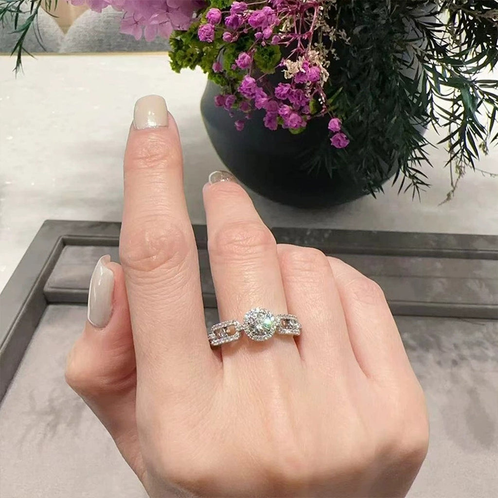 Bezel Round Moissanite Wedding Band with CZ worn on hand to show scale, band width, and ring profile