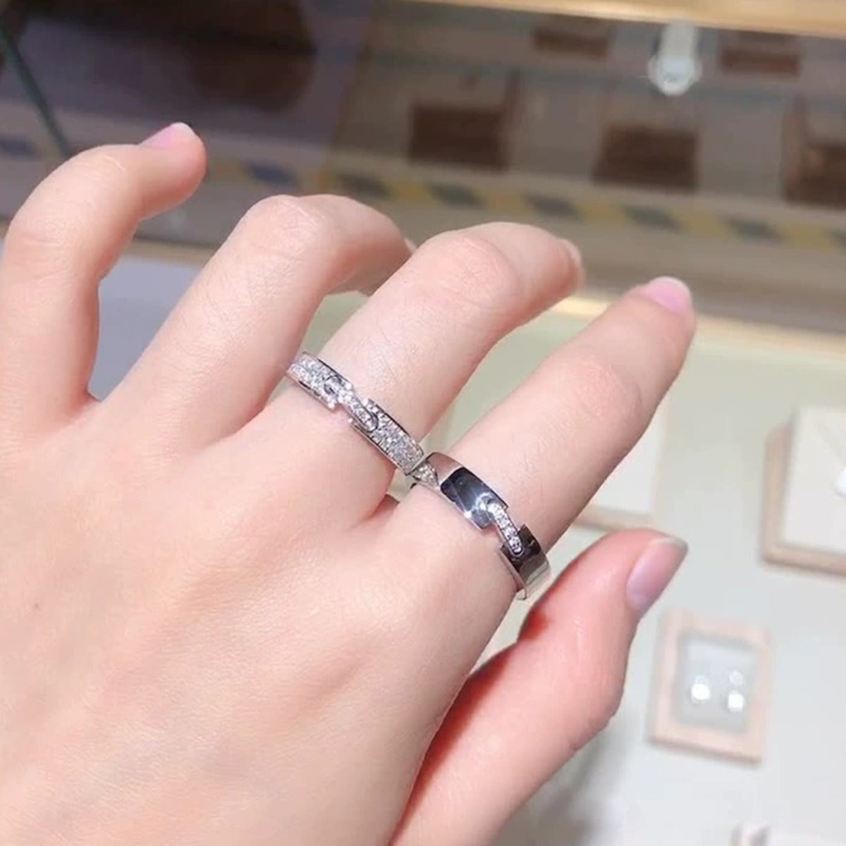 Modern Couples Moissanite Wedding Bands worn on hand to show scale, band width, and ring profile