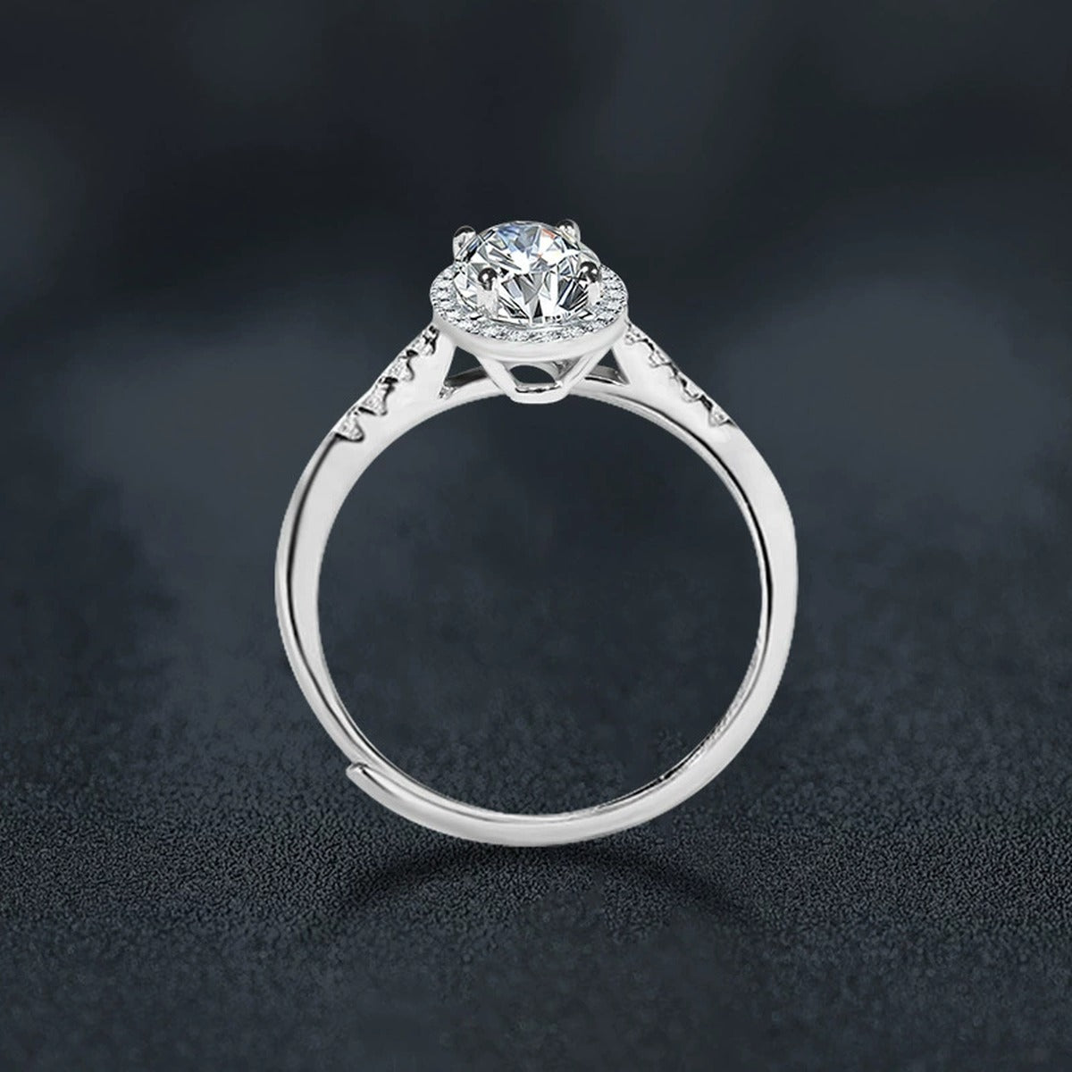 Four-Prong Oval Moissanite Adjustable Engagement Ring with CZ close-up detail view with moissanite sparkle