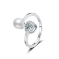 Pearl and Round Moissanite Adjustable Ring with CZ in white gold-plated S925 sterling silver on clean white background