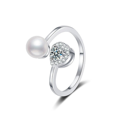 Pearl and Round Moissanite Adjustable Ring with CZ in white gold-plated S925 sterling silver on clean white background