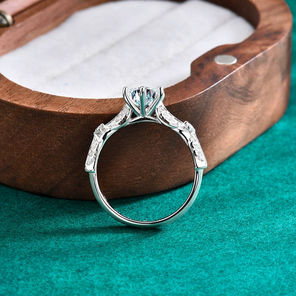 Leaf Accent Round Moissanite Engagement Ring with CZ product view showing moissanite setting and metal finish