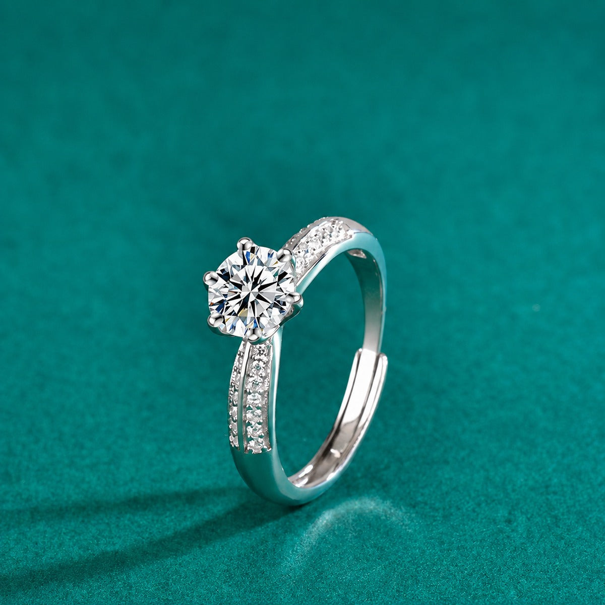 Six-Prong Round Moissanite Adjustable Engagement Ring with CZ close-up detail view with moissanite sparkle