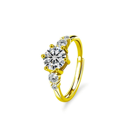 Three-Stone Round Moissanite Engagement Ring with CZ in gold-plated S925 sterling silver on clean white background