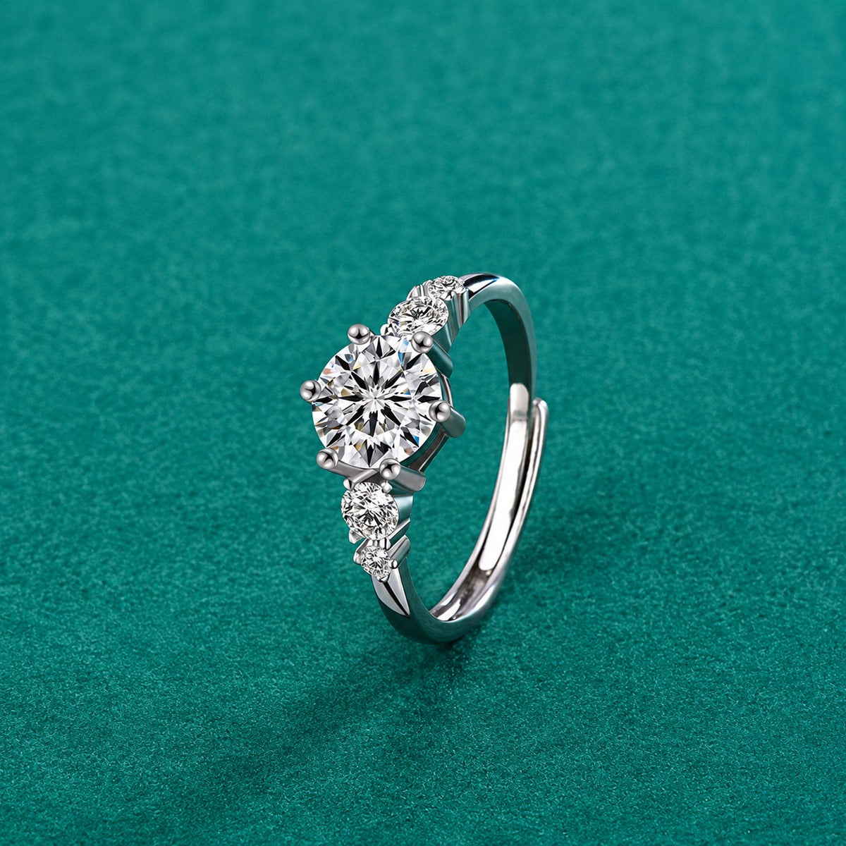 Three-Stone Round Moissanite Engagement Ring with CZ detailed product photo showing ring shape and stone setting