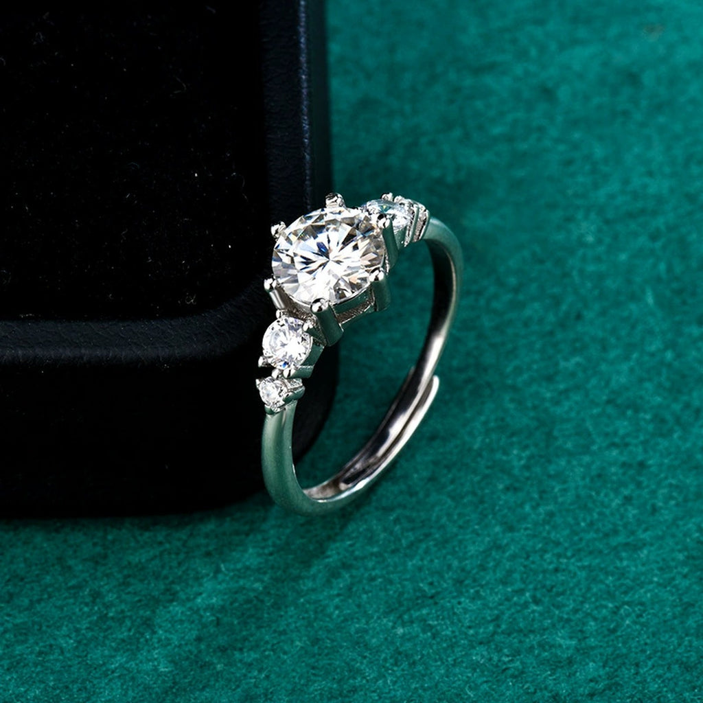 Three-Stone Round Moissanite Engagement Ring with CZ detailed product photo showing ring shape and stone setting