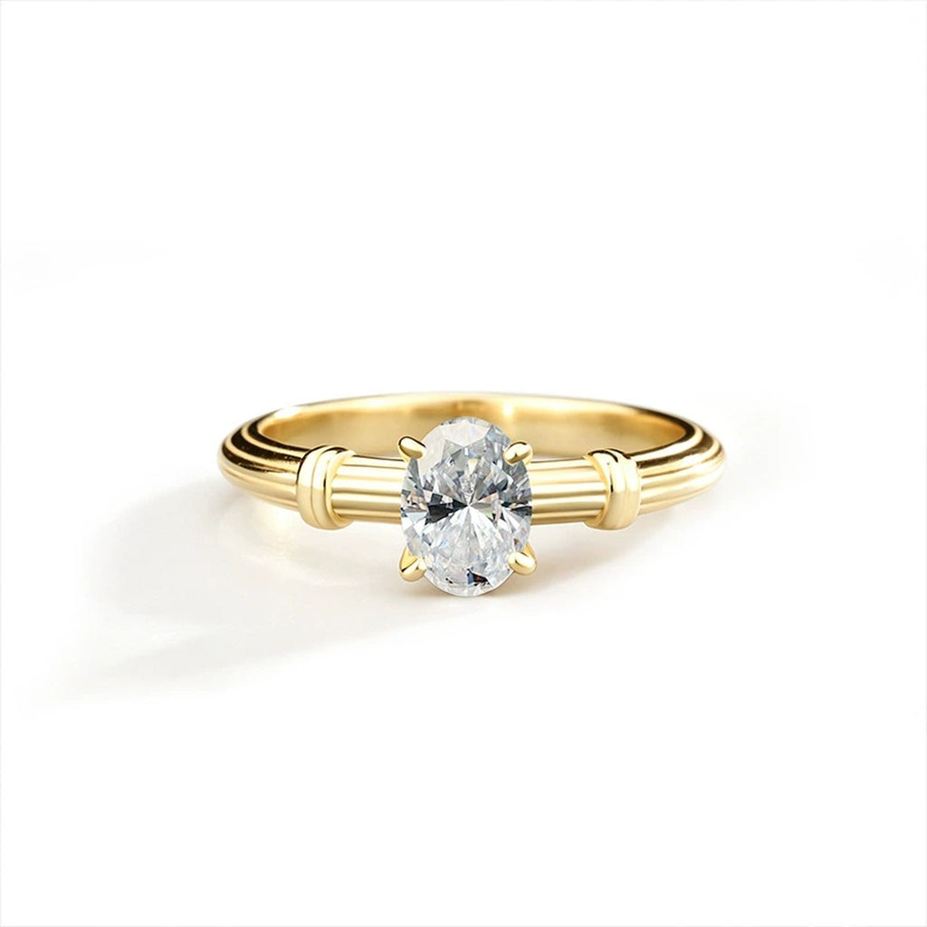 Oval Cut Moissanite Solitaire Engagement Ring in Yellow Gold-Plated S925 Sterling Silver in gold-plated S925 sterling silver on clean white background