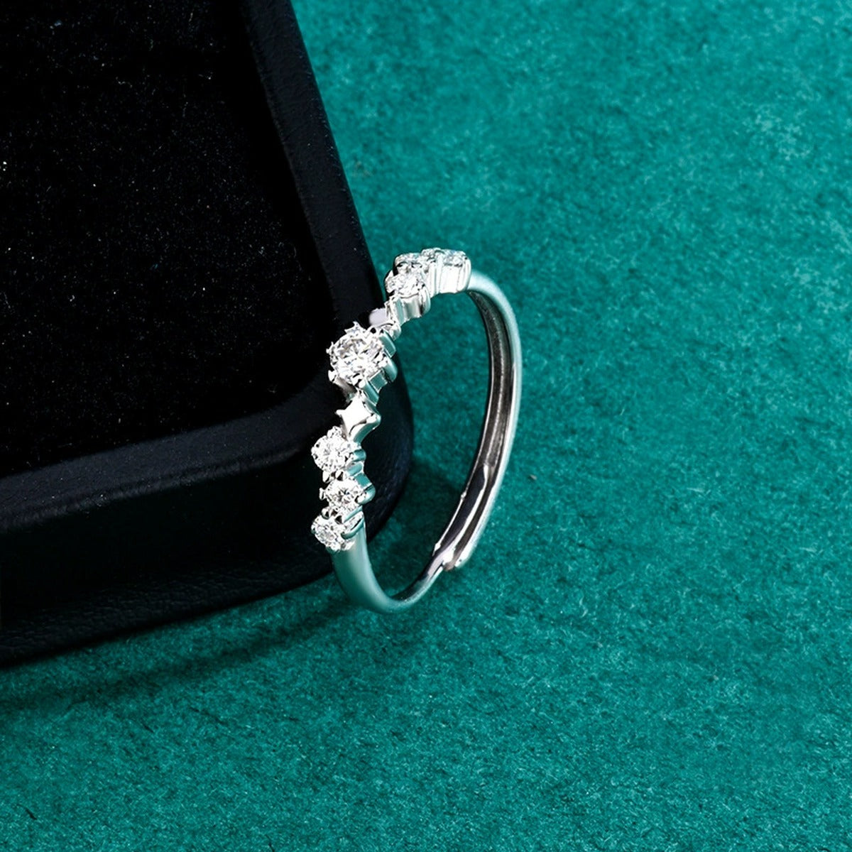 Graduated Round Moissanite Wedding Band detailed product photo showing ring shape and stone setting