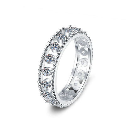 Pave Round Moissanite Eternity Wedding Band in white gold-plated S925 sterling silver on clean white background