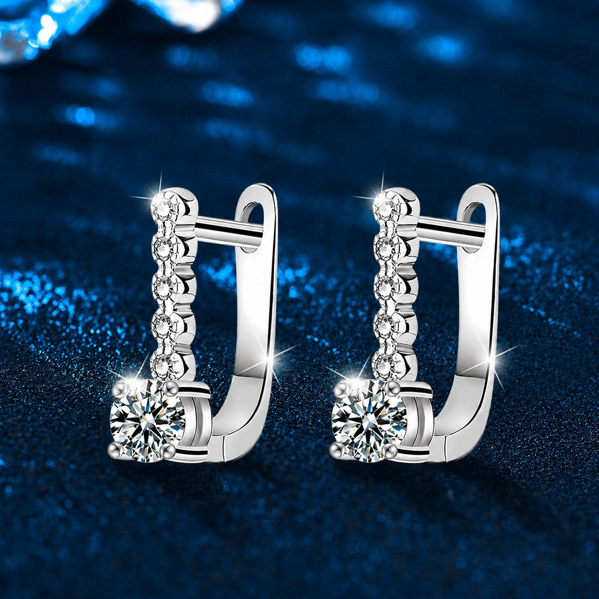 Colored Round Moissanite Huggie Hoop Earrings with CZ in White Gold-Plated S925 sterling silver product scene view showing angled setting detail