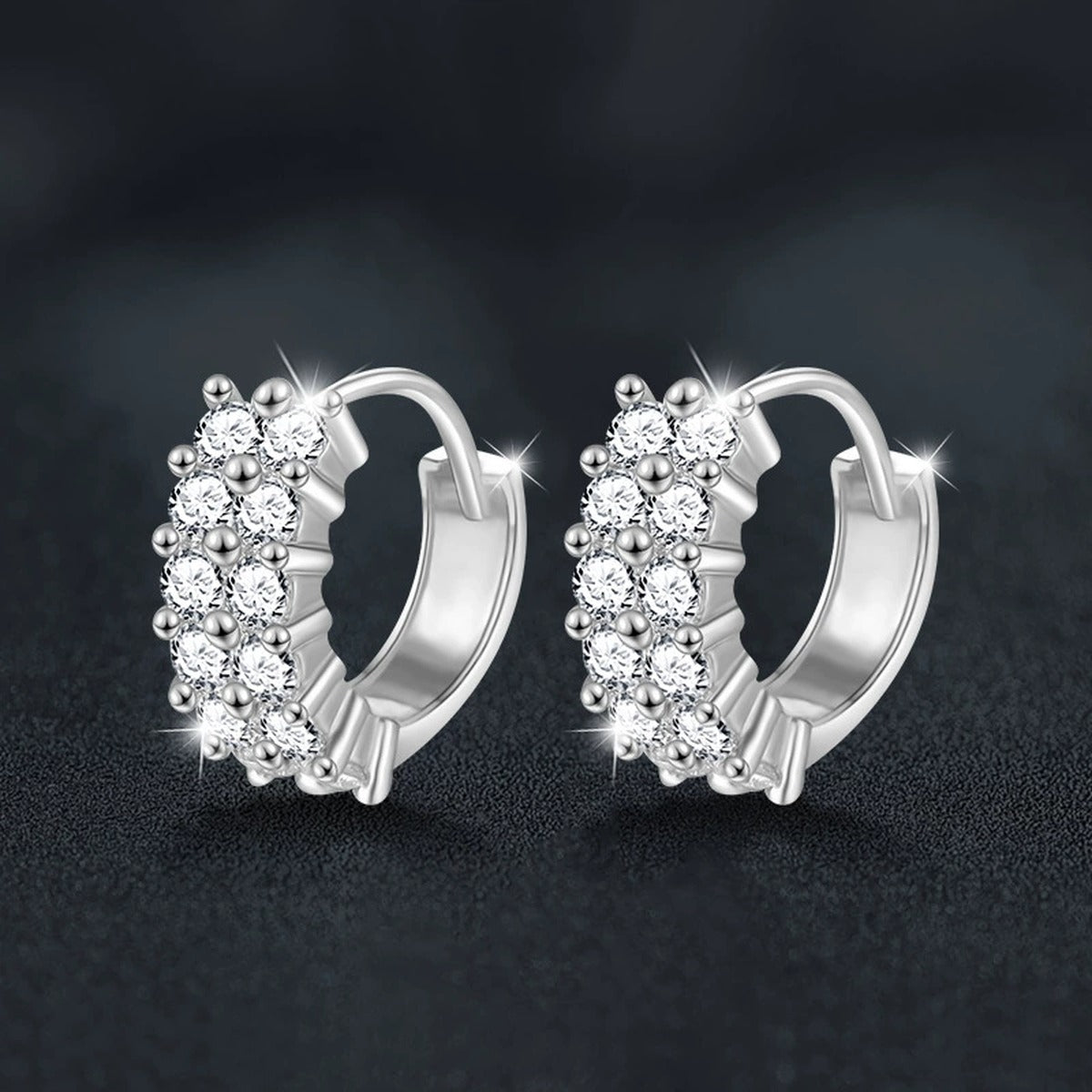 Three-Row Round Moissanite Huggie Hoop Earrings in White Gold-Plated S925 sterling silver product scene view showing angled setting detail
