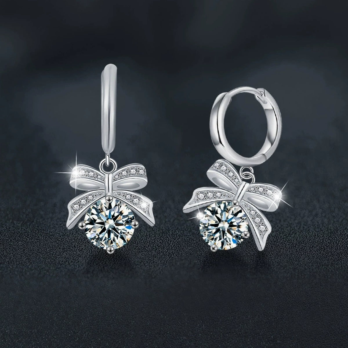 Bowknot Round Moissanite Hoop Dangle Earrings with CZ in White Gold-Plated S925 sterling silver product scene view showing angled setting detail