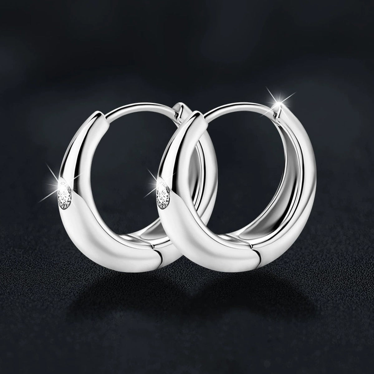 Polished Round Moissanite Hoop Earrings in White Gold-Plated S925 sterling silver product scene view showing angled setting detail