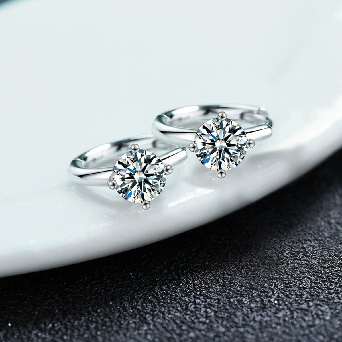Four-Prong Round Moissanite Huggie Hoop Earrings in Gold-Plated S925 sterling silver product scene view showing side profile