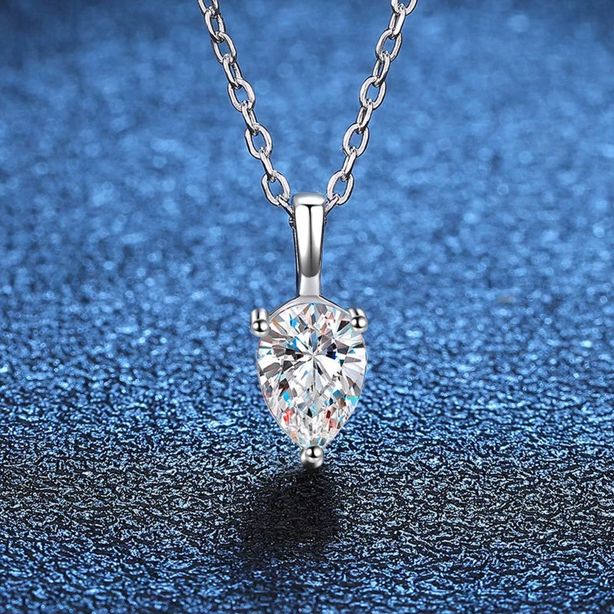 Front view of pear moissanite pendant necklace in platinum-plated S925 silver