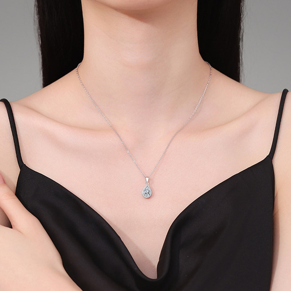 Oval Lab-Grown Gemstone and Moissanite Pendant Necklace in White Gold-Plated S925 Sterling Silver worn on neckline by model