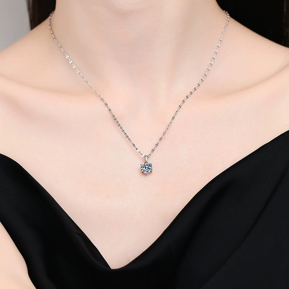 round moissanite solitaire pendant necklace worn by model