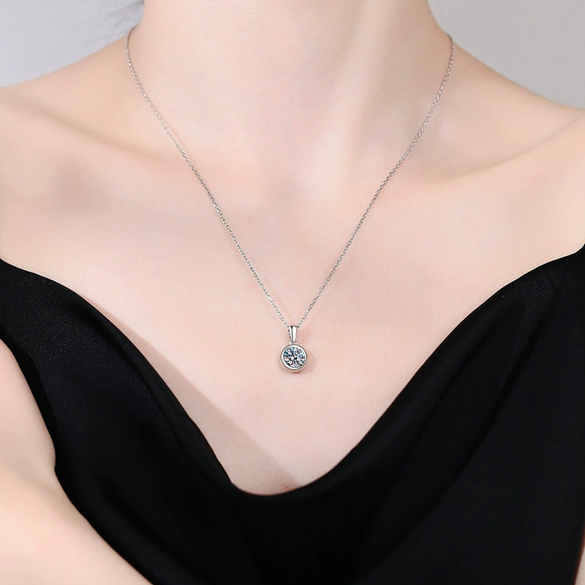bezel round moissanite pendant necklace worn by model