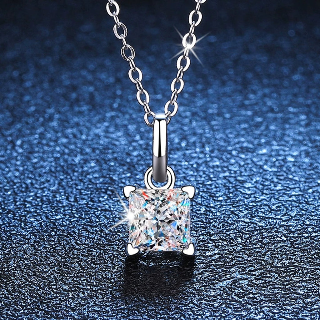 Cushion Moissanite Pendant Necklace in White Gold-Plated S925 Sterling Silver blue background close-up view