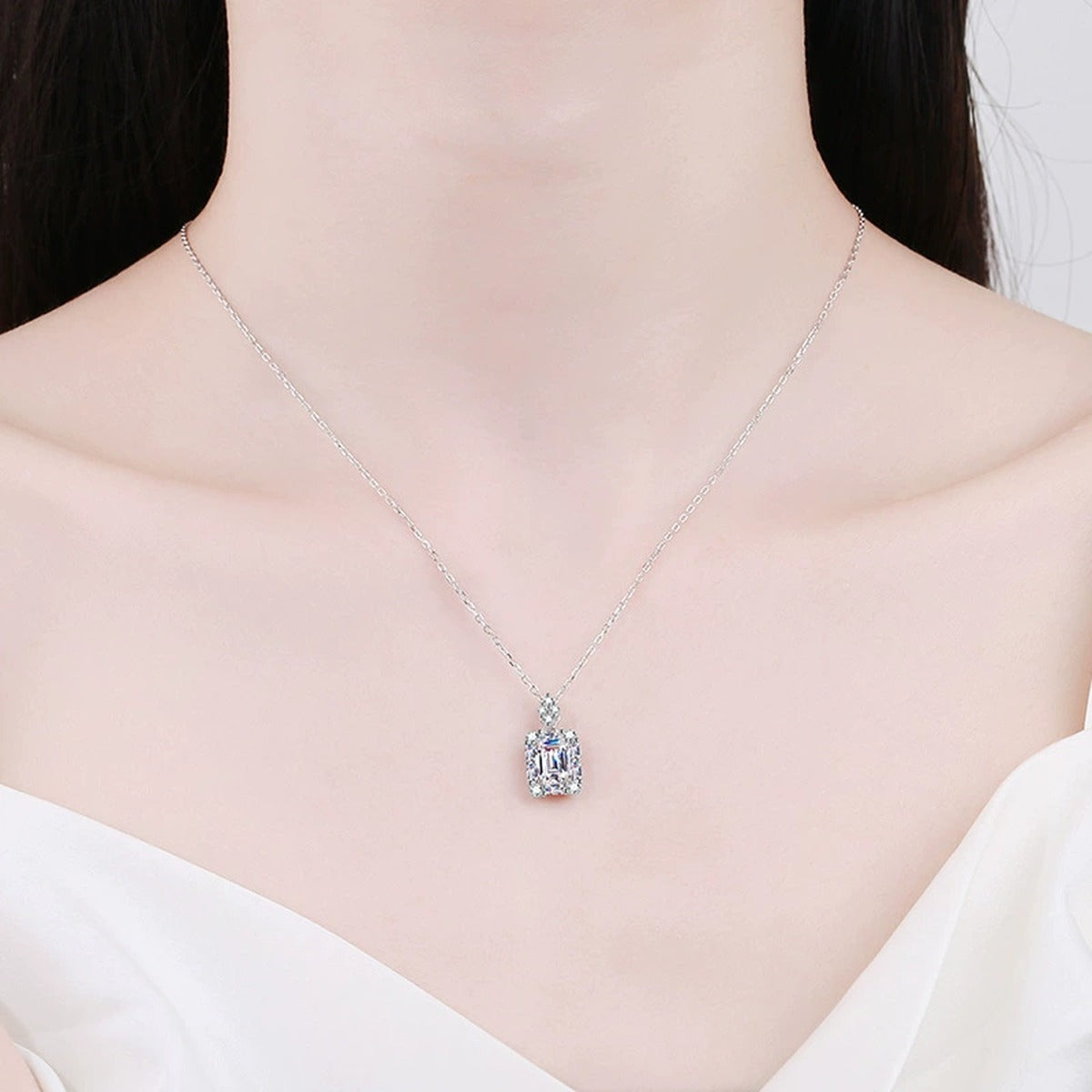emerald cut moissanite pendant necklace model or lifestyle view