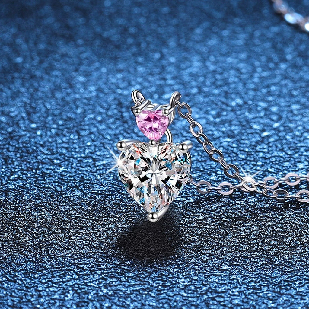 pink accent heart moissanite pendant necklace detail view