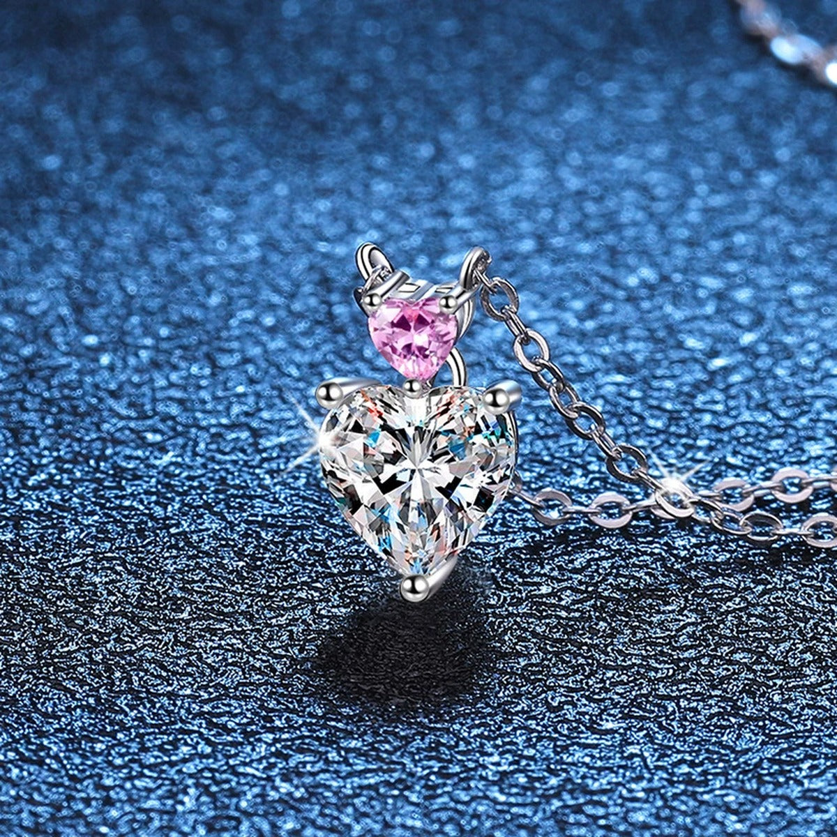 pink accent heart moissanite pendant necklace detail view