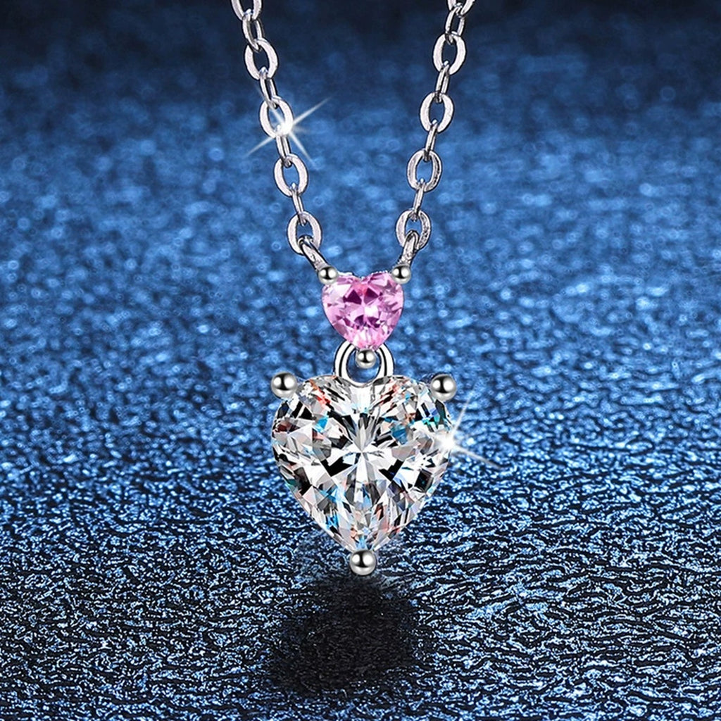 pink accent heart moissanite pendant necklace detail view