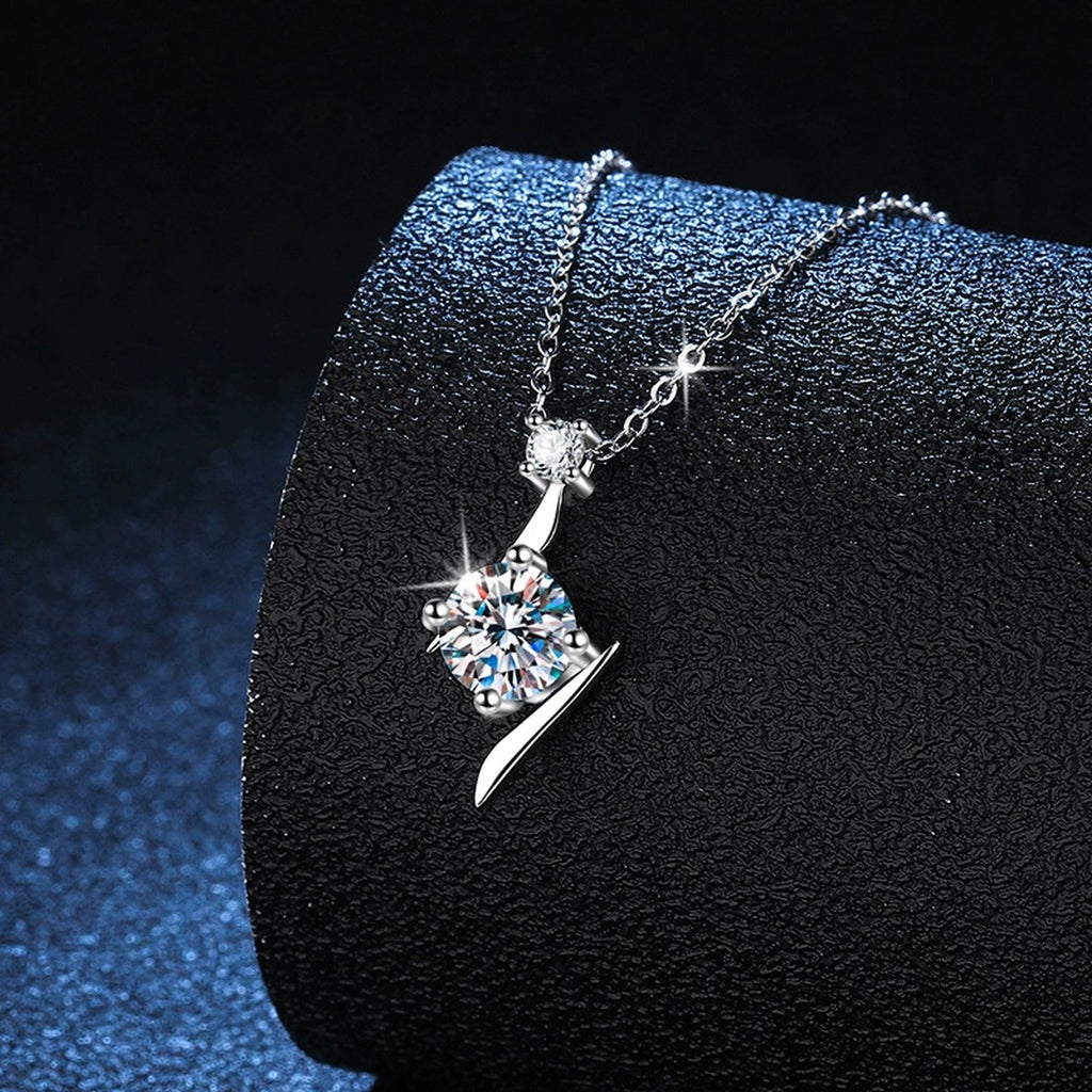 curved round moissanite pendant necklace detail view