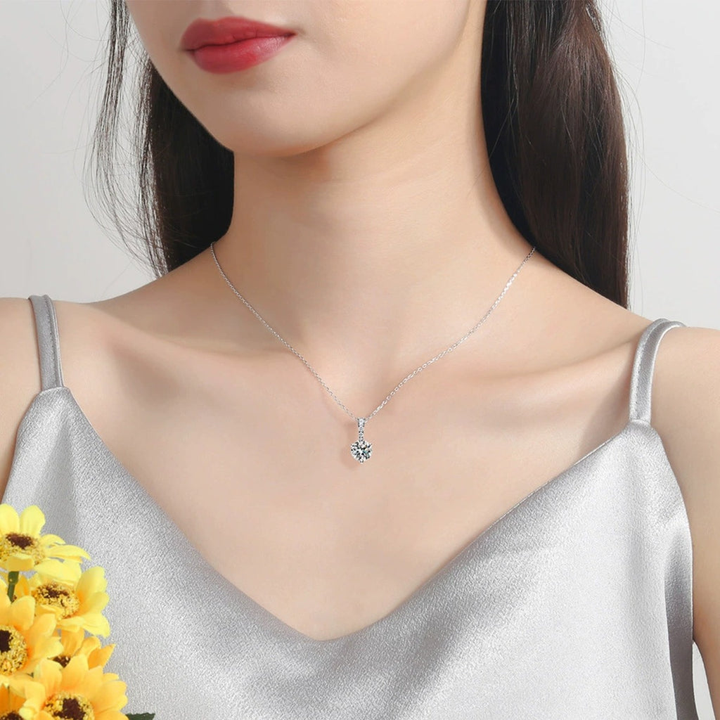 round moissanite pendant necklace with pavé bail model or lifestyle view