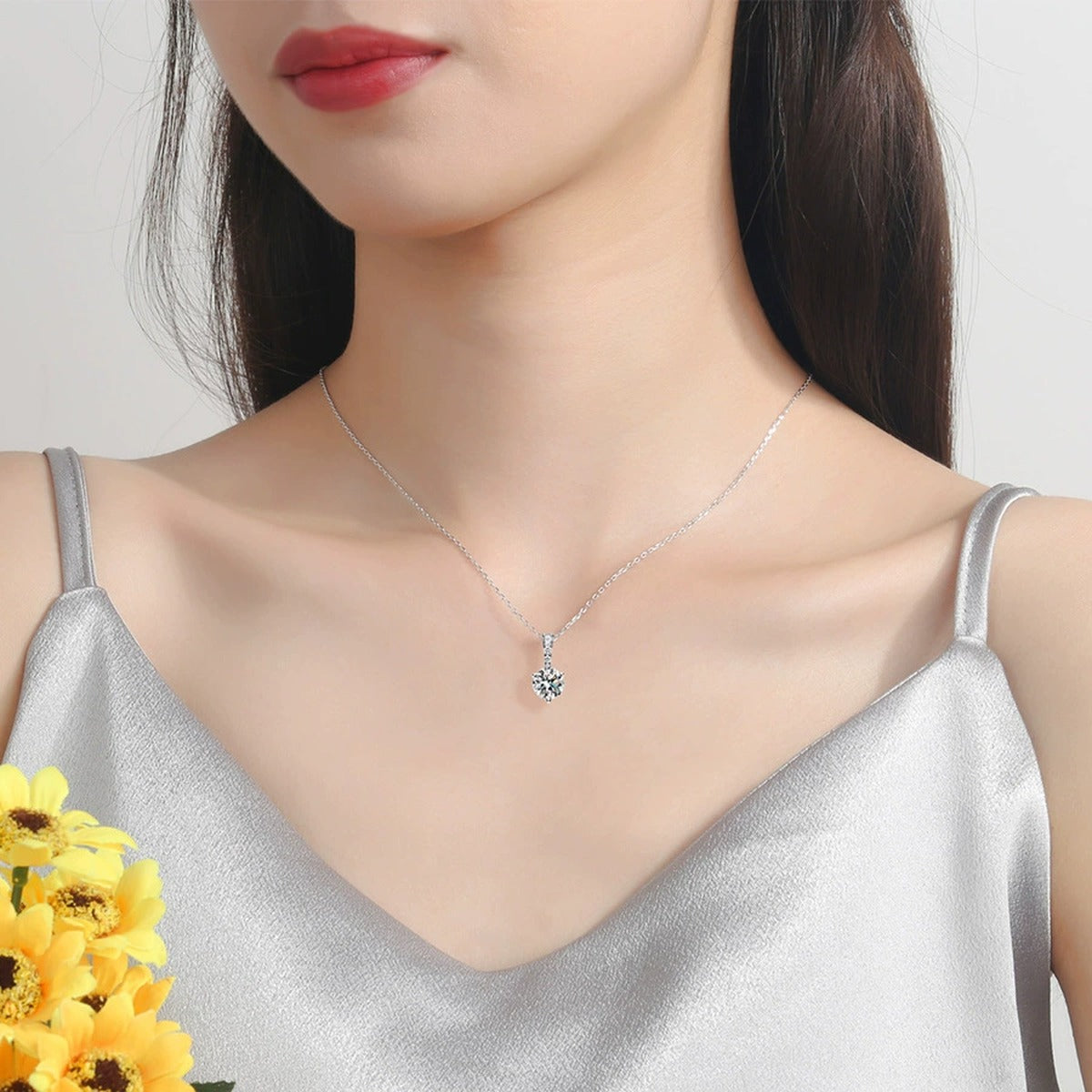 round moissanite pendant necklace with pavé bail model or lifestyle view