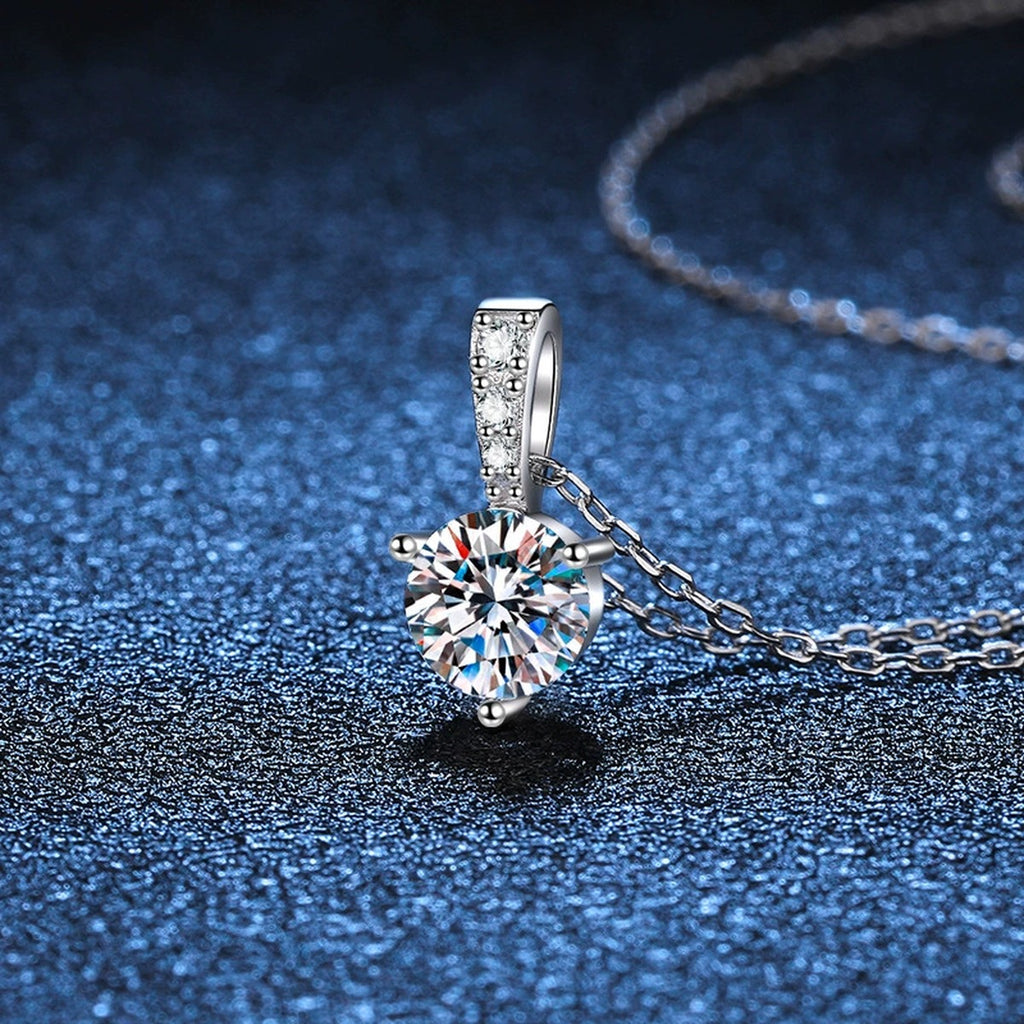 round moissanite pendant necklace with pavé bail detail view